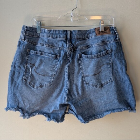 Levi's Mid Rise Distressed Cut Off Denim Shorts Cowgirl Size 14 W 32 - Picture 4 of 9